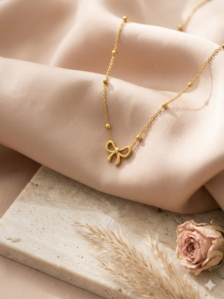 Golden Bow Whisper Necklace