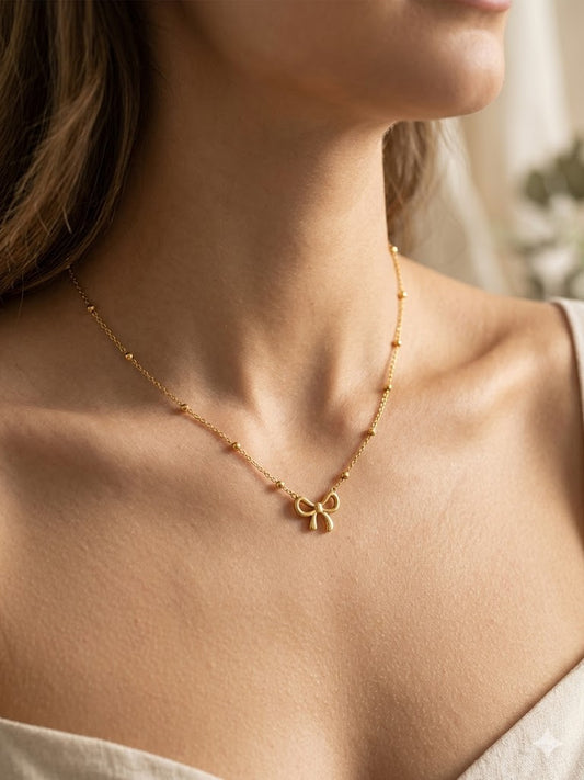 Golden Bow Whisper Necklace