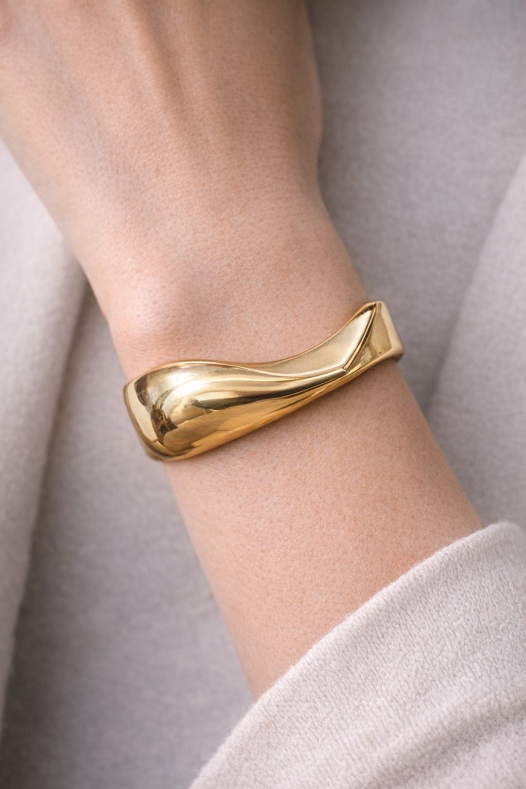 Sculpted Wave Gold-Tone Statement Bangle