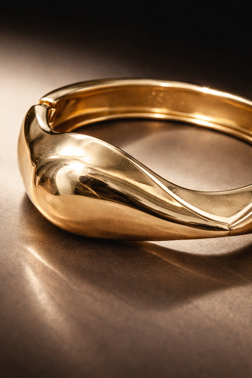 Sculpted Wave Gold-Tone Statement Bangle
